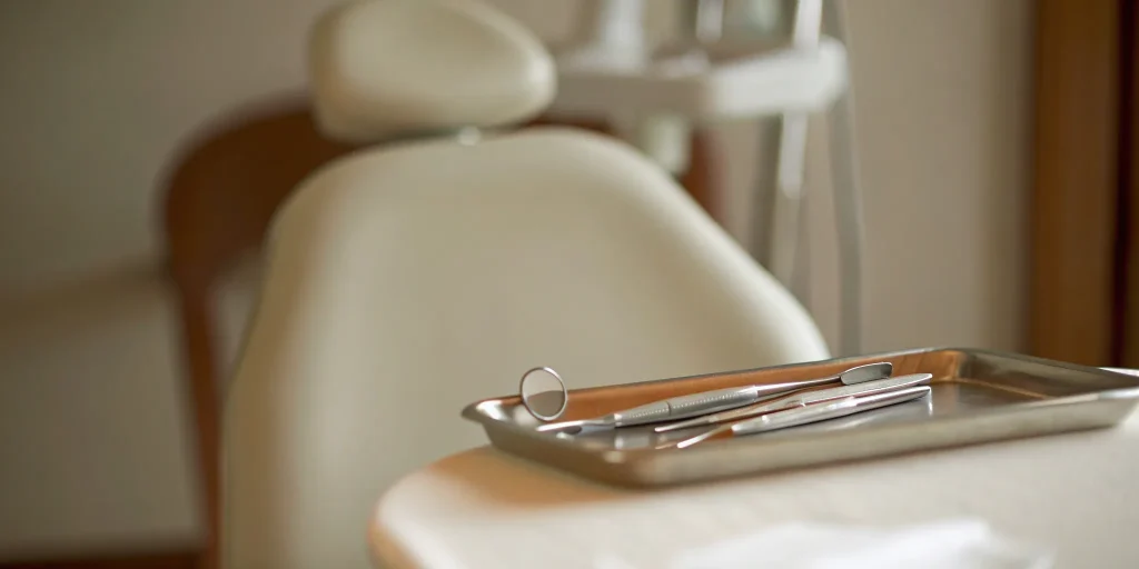Dental tools on a tray for preparing a tooth for a crown.